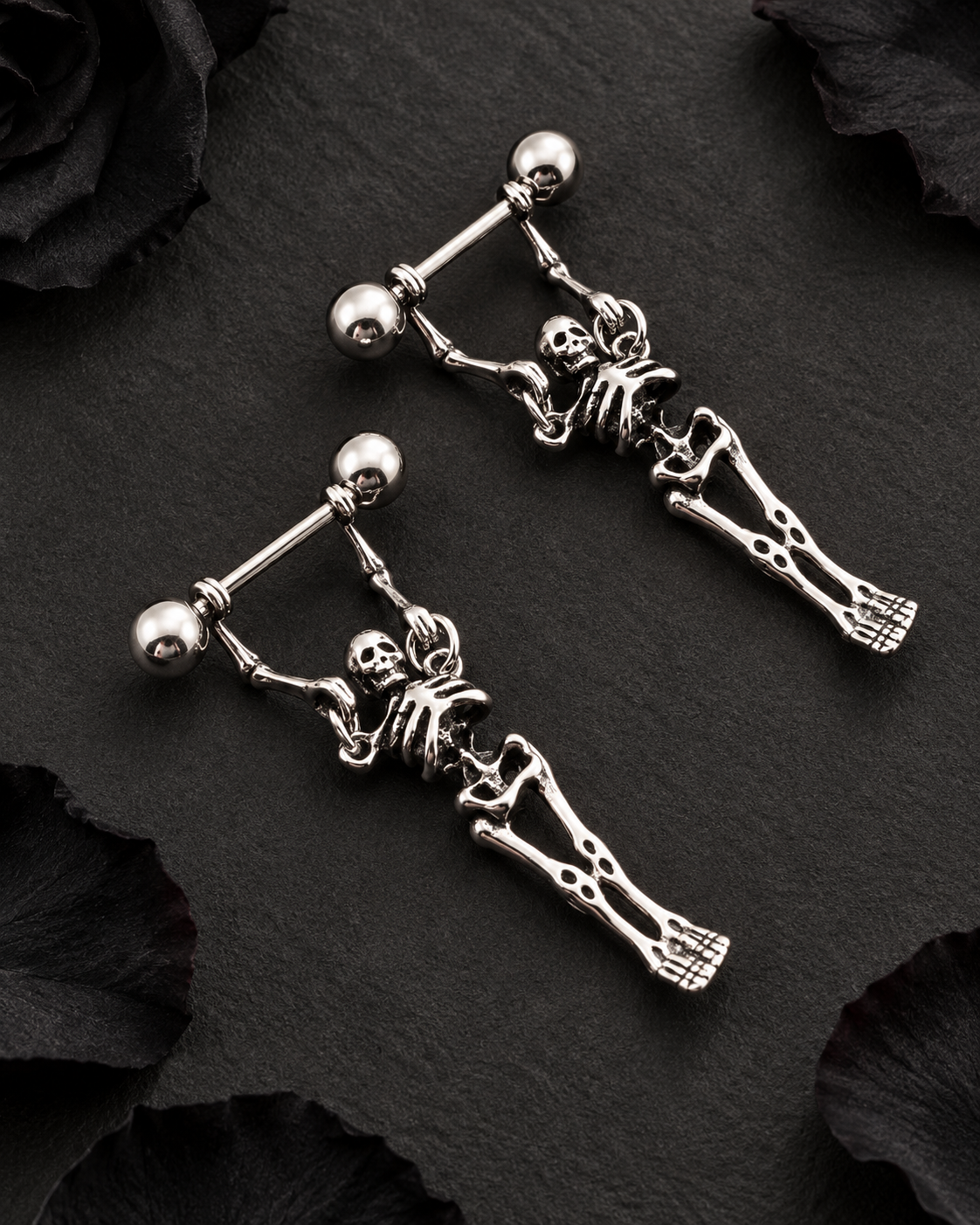 Pair of gothic skeleton dangle jewelry pieces