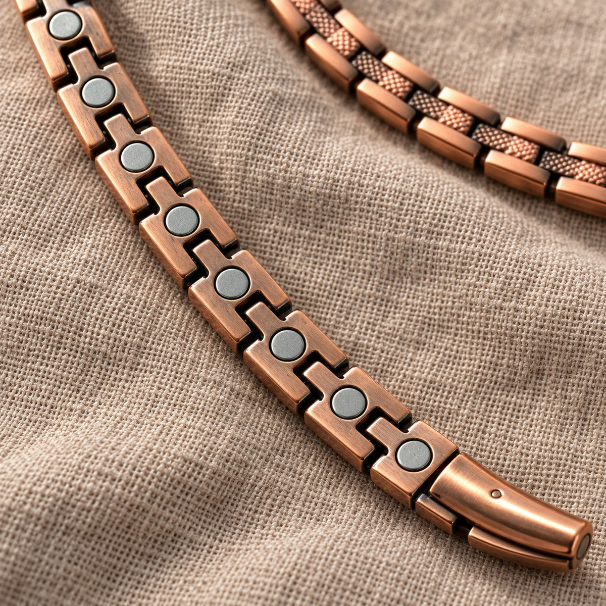 Back of the copper chain links showing the inset magnets