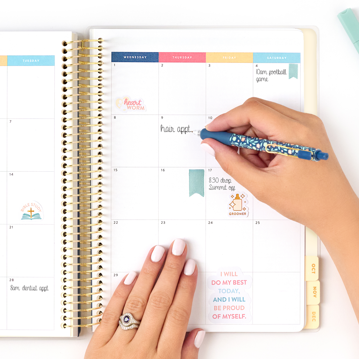 2027 blush home planner monthly page being written in