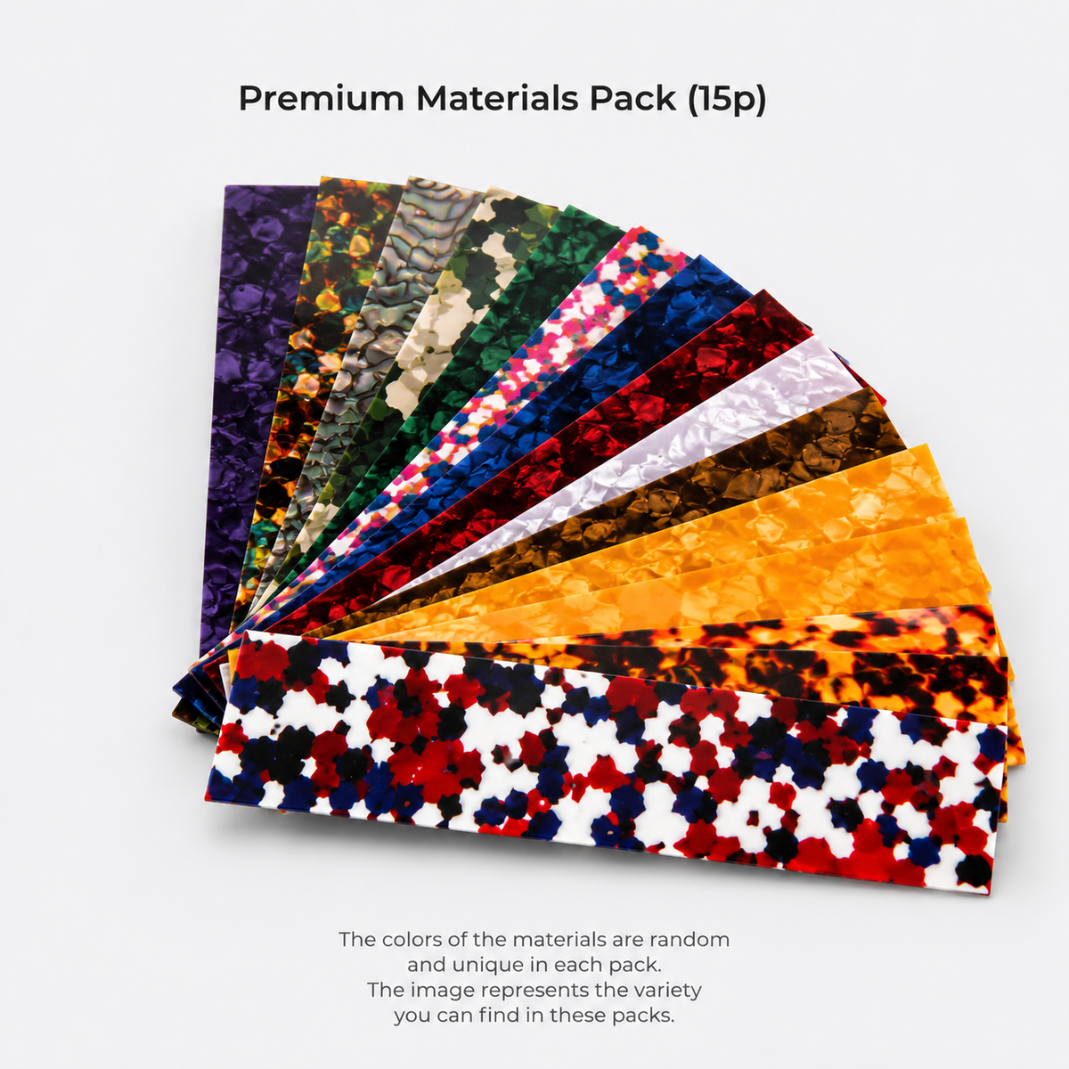 Fan of fifteen assorted colorful guitar pick material sheets