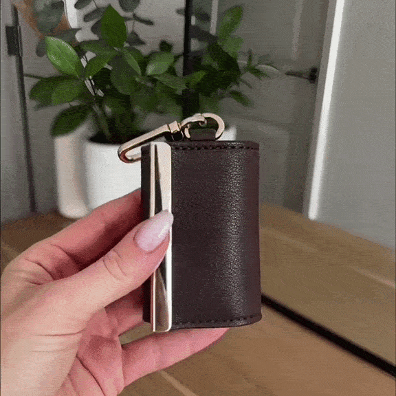Foldable keychain tote bag opening from its compact pouch