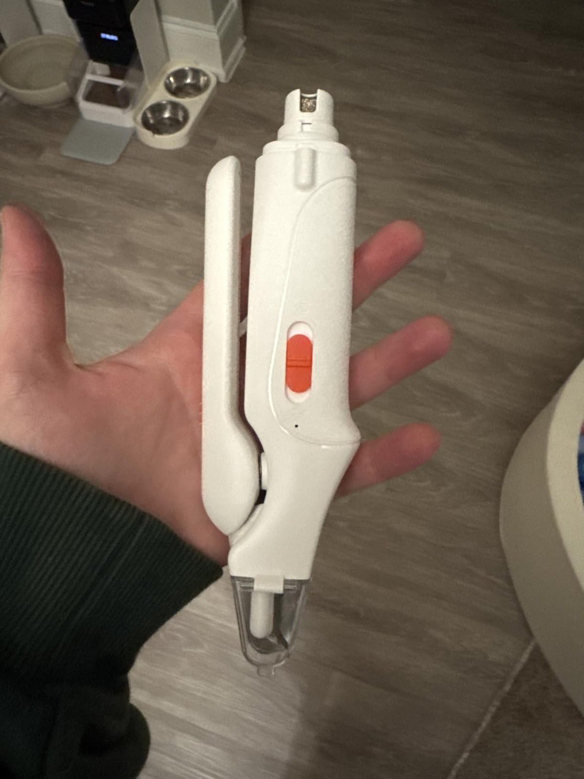 White 2-in-1 pet nail clipper and grinder with feature details