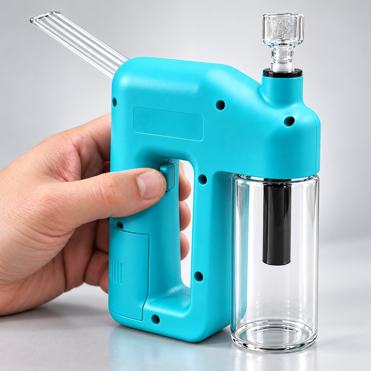 Close view of a thumb pressing the integrated side switch beside the clear chamber